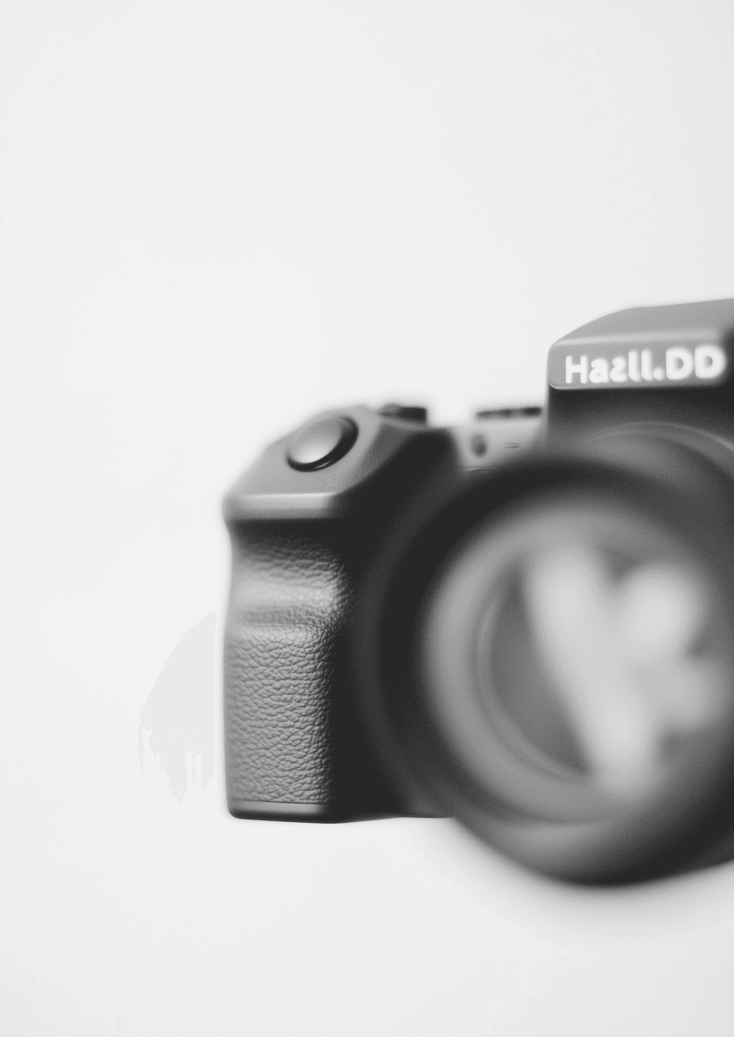 Close-up of a camera, softly out of focus
